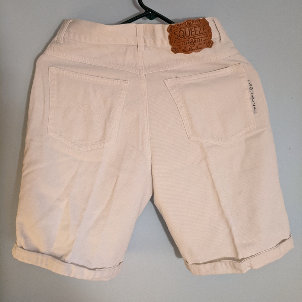 Women's white denim cuffed button up shorts - Picture 2 of 5